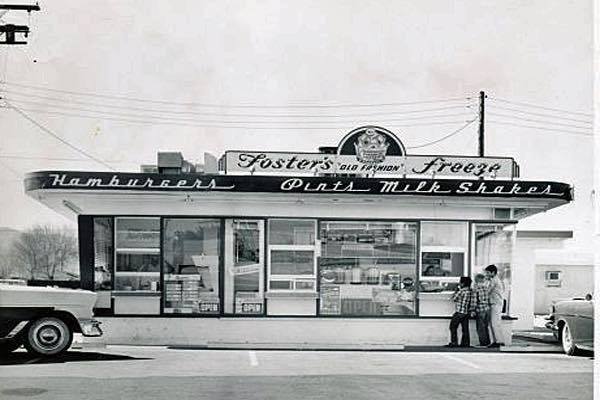Vintage black-and-white photograph of the Foster's Freeze Palo Alto location circa 1950, showing the classic walk-up window and signage